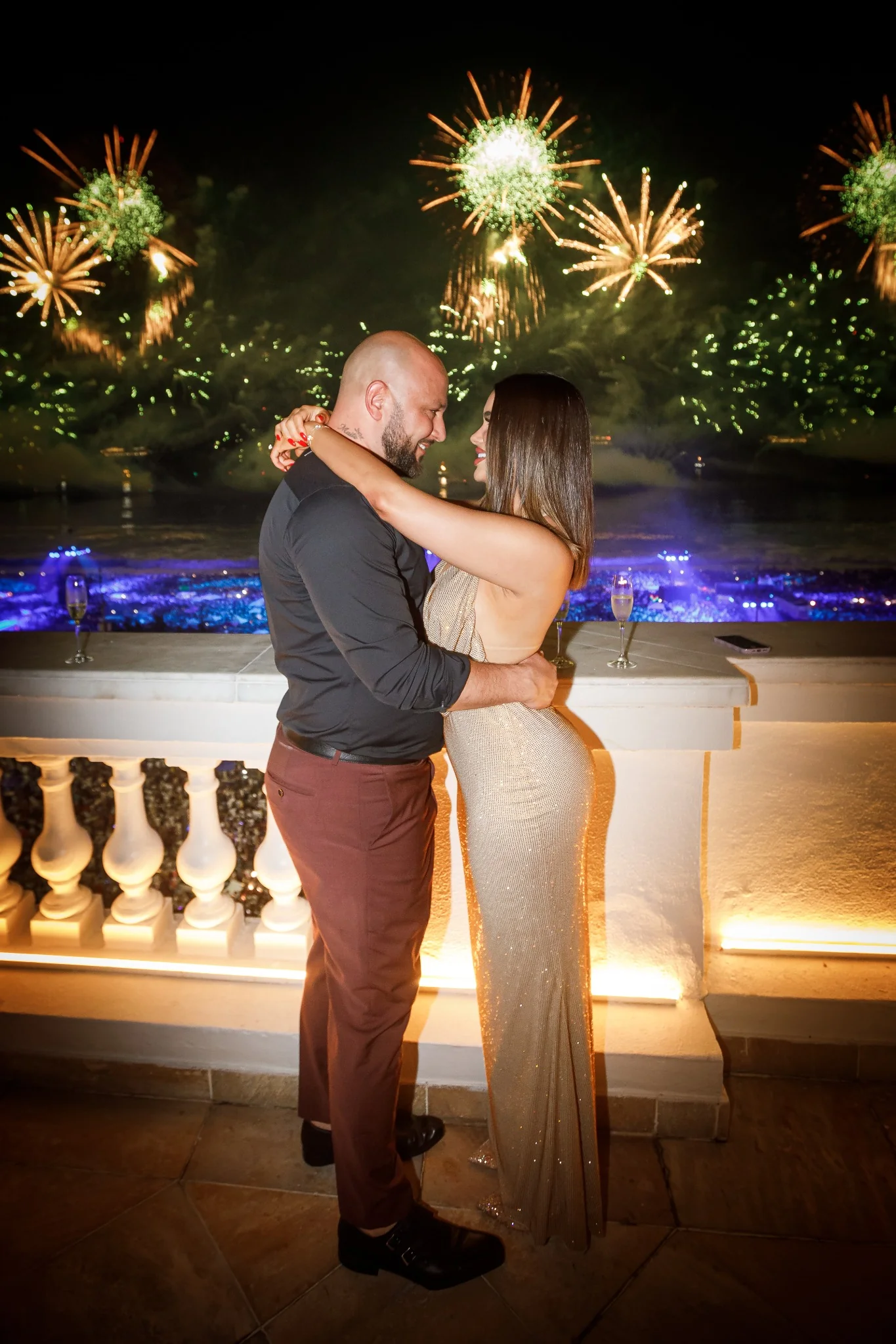 Couple embracing after their engagement at Copacabana Palace.